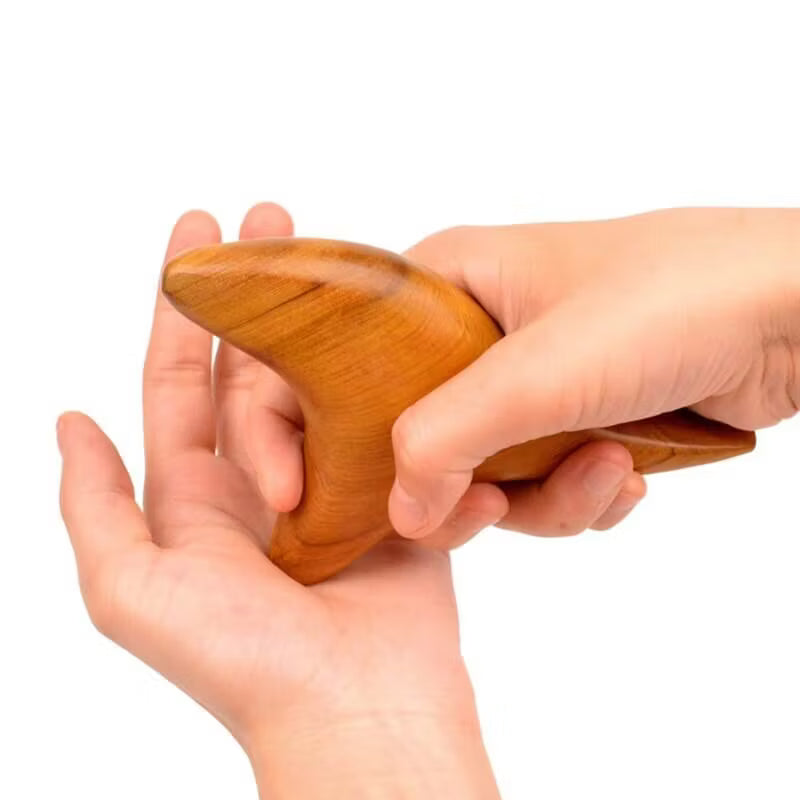 Fotmassage träverktyg